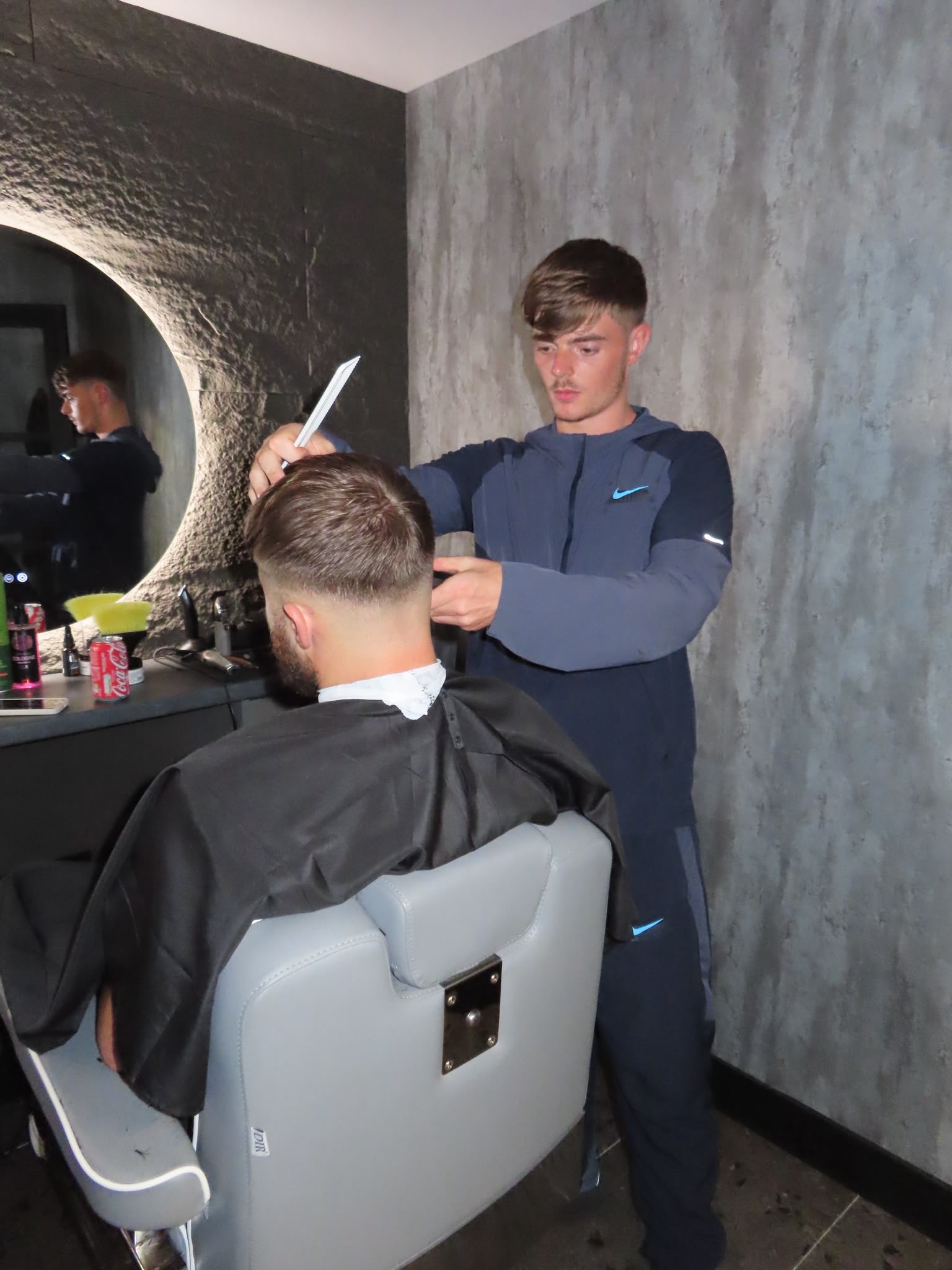 Jack cutting hair at Reset MCR